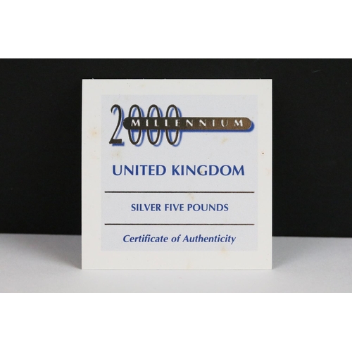 63 - A United Kingdom Royal Mint silver proof Piedfort 1988 £1 coin together with  a 2000 silver proof £5... 