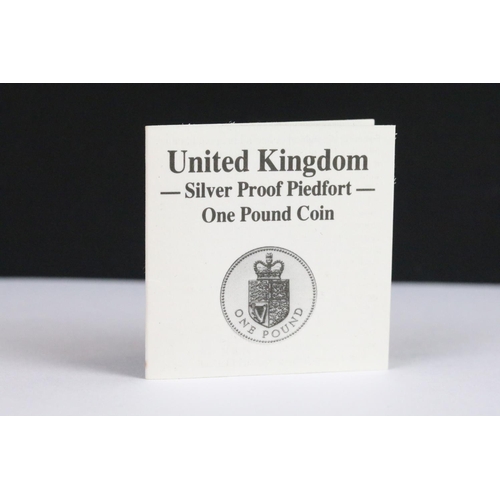 63 - A United Kingdom Royal Mint silver proof Piedfort 1988 £1 coin together with  a 2000 silver proof £5... 