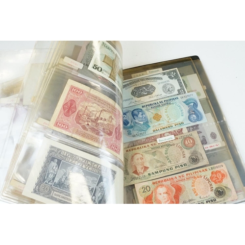 7 - A large collection of British, Commonwealth and World banknotes contained within a collectors folder... 