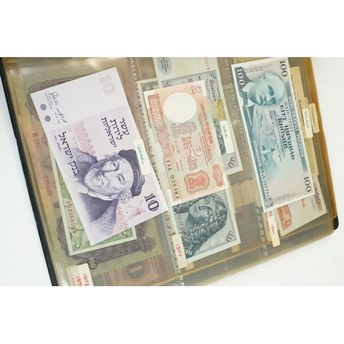 7 - A large collection of British, Commonwealth and World banknotes contained within a collectors folder... 