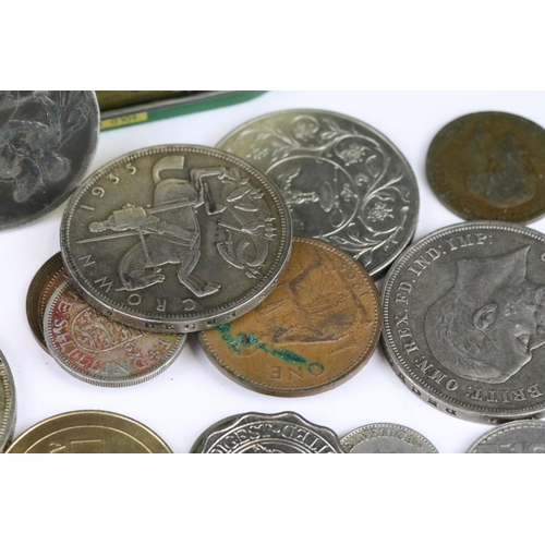 72 - A small collection of British pre decimal and world coins to include four silver crown coins.