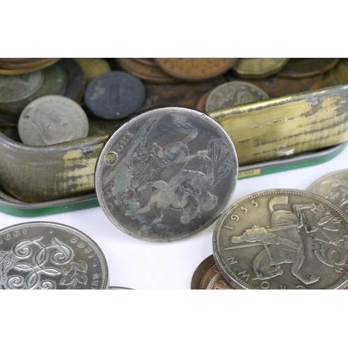 72 - A small collection of British pre decimal and world coins to include four silver crown coins.