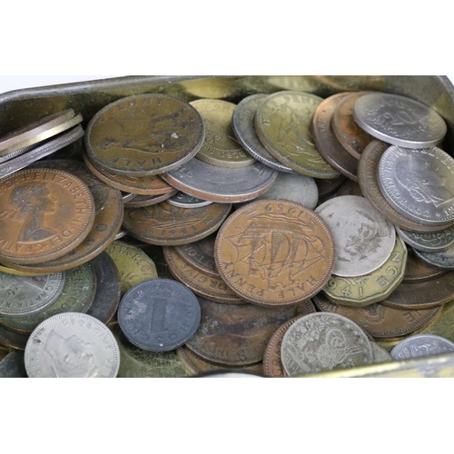 72 - A small collection of British pre decimal and world coins to include four silver crown coins.