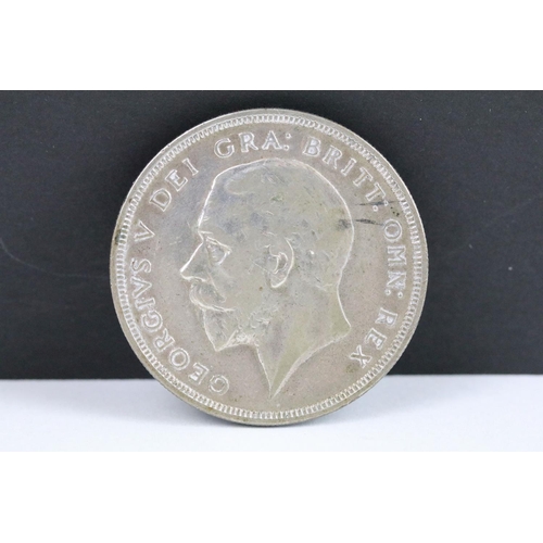 77 - A British King George V 1929 silver wreath crown coin together with a 1937 crown coin.