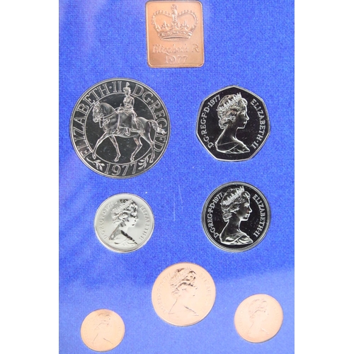 80 - A collection of eleven Royal Mint uncirculated coin year sets to include 1974, 1975, 1977, 1973, 197... 