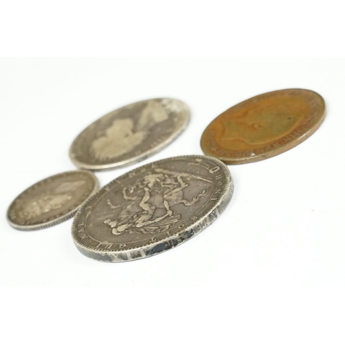 9 - A small group of four British pre decimal coins to include a King George III 1819 full silver crown ... 