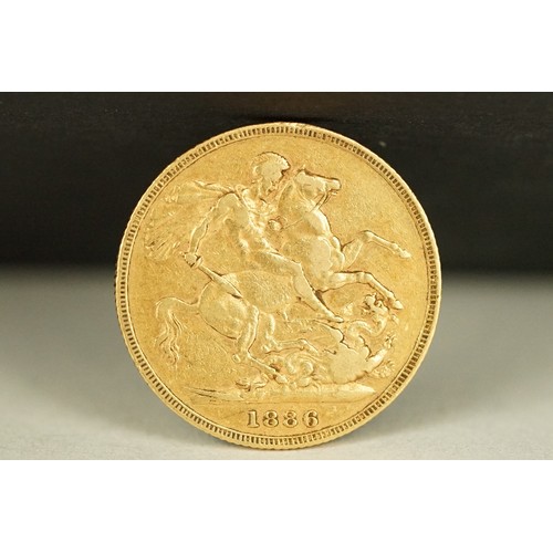 228 - A British Queen Victoria 1886 gold full sovereign coin.