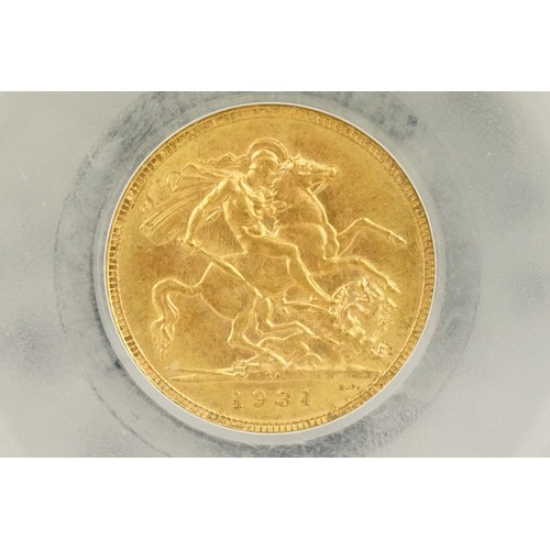 230 - A King George V 1931 South Africa Mint gold full sovereign coin, CGS slab mounted.