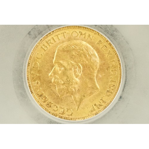 230 - A King George V 1931 South Africa Mint gold full sovereign coin, CGS slab mounted.