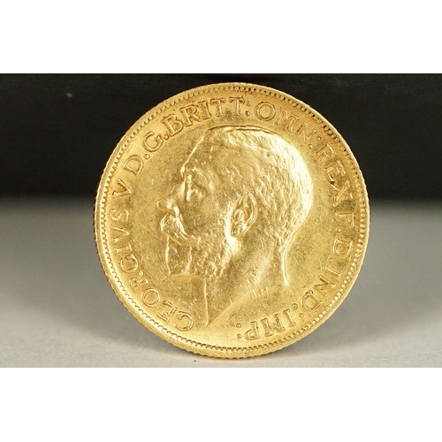 234 - A King George V 1911 gold full sovereign coin with Sydney Mint mark.