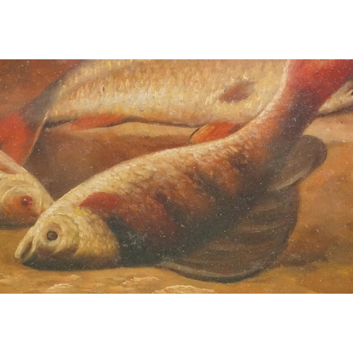 39 - Freshwater fish and creel on a riverbank, oil on board, 17 x 25cm, framed and glazed