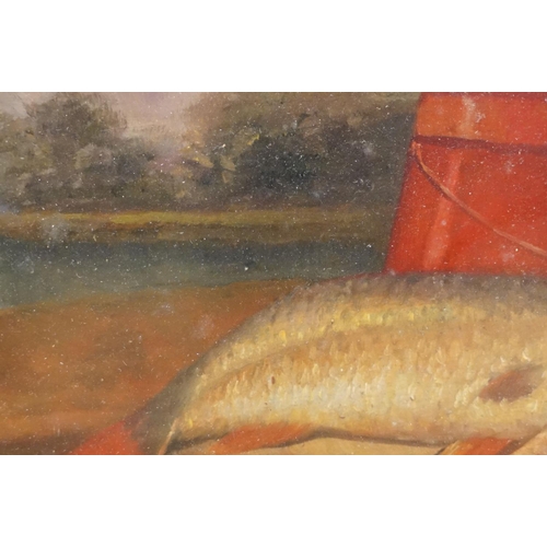 39 - Freshwater fish and creel on a riverbank, oil on board, 17 x 25cm, framed and glazed