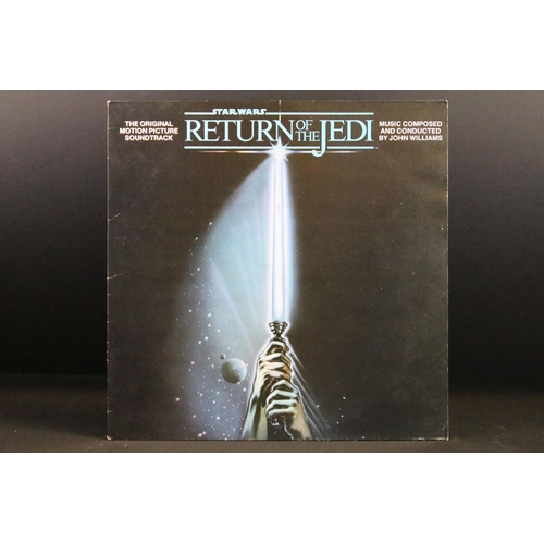 127 - Vinyl - 8 Film related LPs to include Return Of The Jedi x 2 (one with 16 page photobook), The Story... 