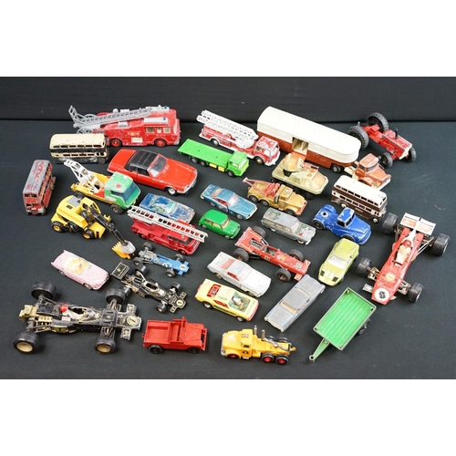 1286 - Around 30 play worn diecast models from the 1960s onwards to include Triang Spot On, Corgi, Lonestar... 