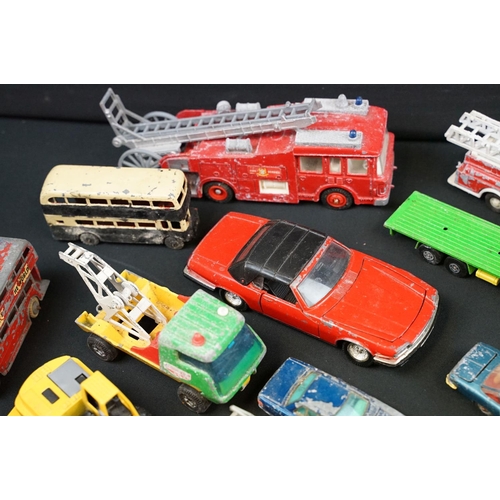 1286 - Around 30 play worn diecast models from the 1960s onwards to include Triang Spot On, Corgi, Lonestar... 