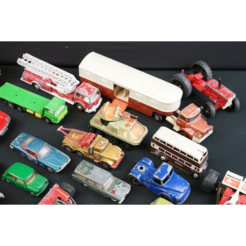 1286 - Around 30 play worn diecast models from the 1960s onwards to include Triang Spot On, Corgi, Lonestar... 