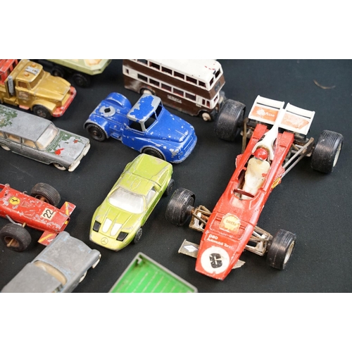 1286 - Around 30 play worn diecast models from the 1960s onwards to include Triang Spot On, Corgi, Lonestar... 