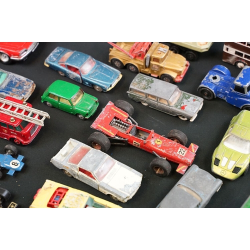 1286 - Around 30 play worn diecast models from the 1960s onwards to include Triang Spot On, Corgi, Lonestar... 