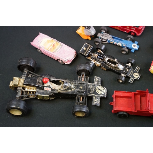 1286 - Around 30 play worn diecast models from the 1960s onwards to include Triang Spot On, Corgi, Lonestar... 