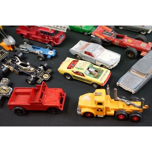 1286 - Around 30 play worn diecast models from the 1960s onwards to include Triang Spot On, Corgi, Lonestar... 