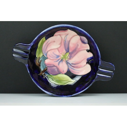 63 - Moorcroft pottery blue ground Magnolia pattern ashtray, impressed marks to base, approx 22cm long