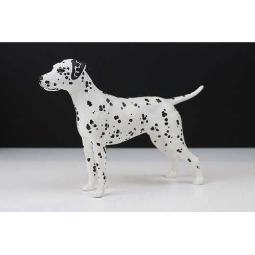 73 - Group of Beswick porcelain animals to include a Shire horse, 'Arnoldene' Dalmatian, foal, Border Col... 