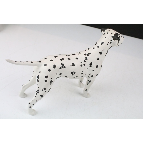 73 - Group of Beswick porcelain animals to include a Shire horse, 'Arnoldene' Dalmatian, foal, Border Col... 