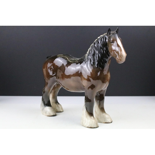 73 - Group of Beswick porcelain animals to include a Shire horse, 'Arnoldene' Dalmatian, foal, Border Col... 
