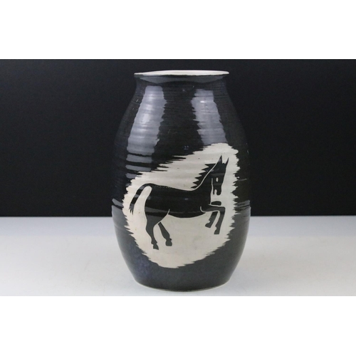 78 - Eric Leaper of Newlyn Pottery, dark grey ground Pottery Vase decorated with a horse, impressed marks... 