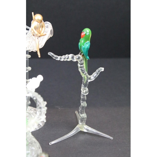 83 - Over 30 Murano glass figures to include Doves, Swans, Dogs, Deer and many more