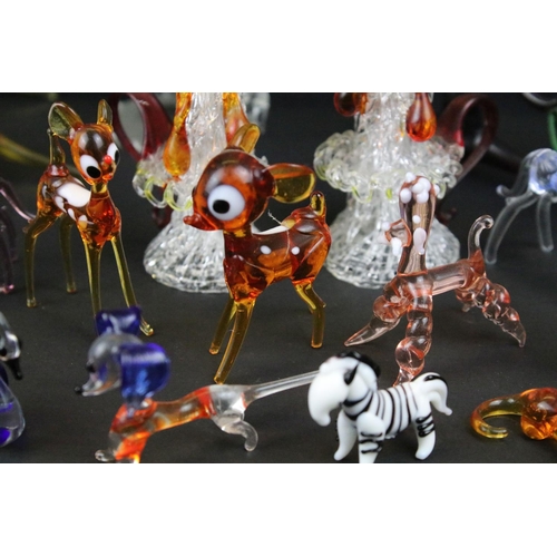 83 - Over 30 Murano glass figures to include Doves, Swans, Dogs, Deer and many more