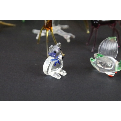 83 - Over 30 Murano glass figures to include Doves, Swans, Dogs, Deer and many more