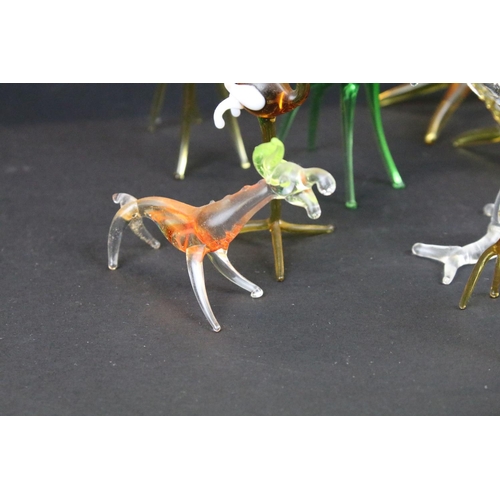 83 - Over 30 Murano glass figures to include Doves, Swans, Dogs, Deer and many more