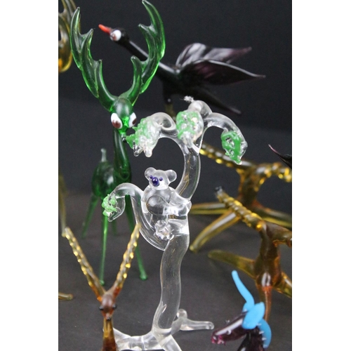 83 - Over 30 Murano glass figures to include Doves, Swans, Dogs, Deer and many more