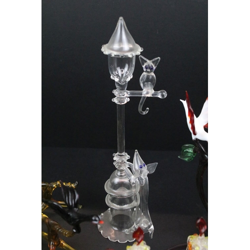 83 - Over 30 Murano glass figures to include Doves, Swans, Dogs, Deer and many more