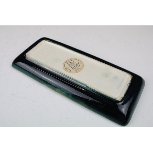 86 - Moorcroft Clematis pattern green ground rectangular tray, label to reverse, approx 20.5cm long