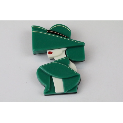 264 - Two Lea Stein style brooches in the form of Art Nouveau ladies.