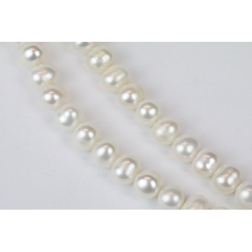 276 - Double row of fresh water pearls with panther head clasp set with rubies