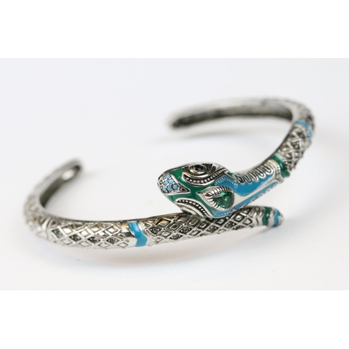 277 - A 925 sterling silver bangle in the form of a snake, marked 925 to the verso.