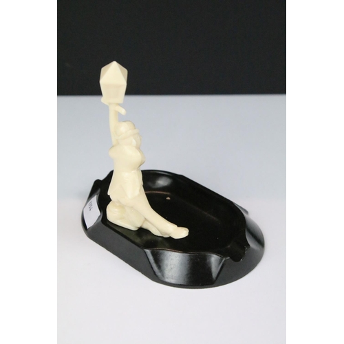 314 - Two novelty 'Selcol' ashtrays depicting drunken men against lamposts with comical slogans.