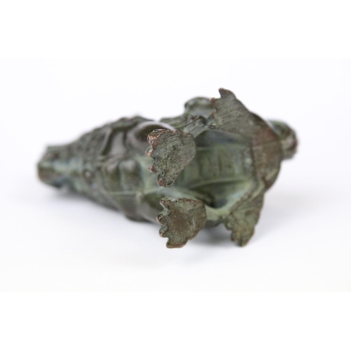 317 - A Chinese ornamental bronze dog of faux statue.