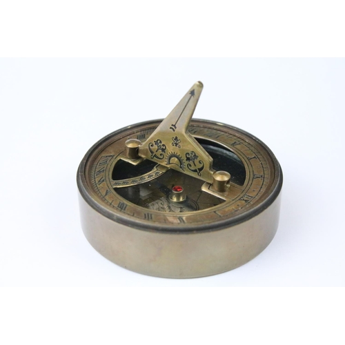 319 - Brass cased compass and sundial