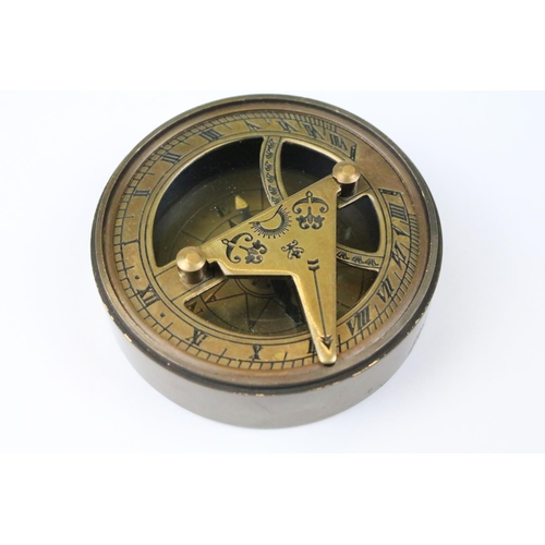 319 - Brass cased compass and sundial