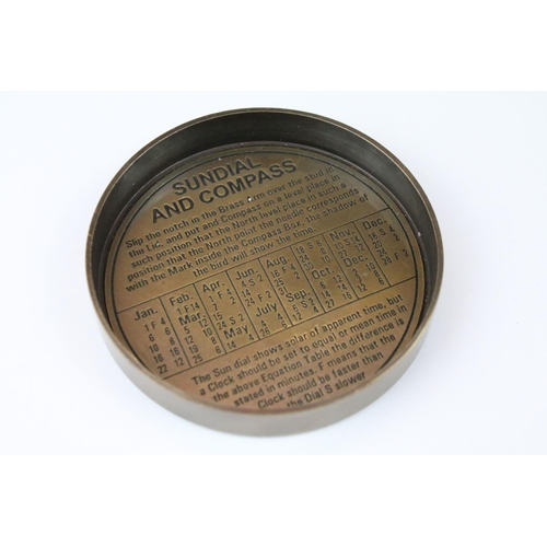 319 - Brass cased compass and sundial
