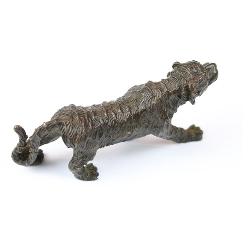 321 - A Chinese bronze ornamental figure of a tiger.