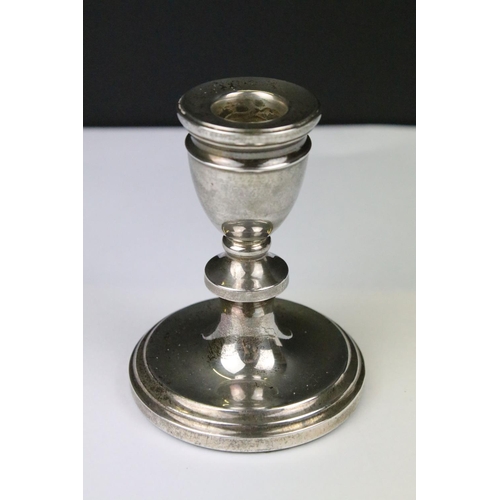 323 - A pair of fully hallmarked sterling silver candlesticks, assay marked for Birmingham.
