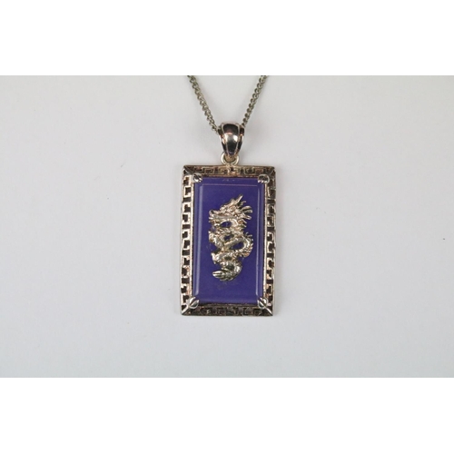 324 - Chinese Silver and Lavender Jade Pendant on Chain with a dragon design, cased
