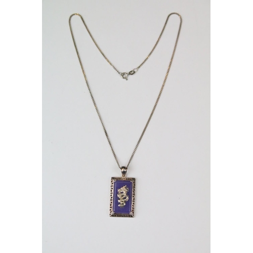324 - Chinese Silver and Lavender Jade Pendant on Chain with a dragon design, cased