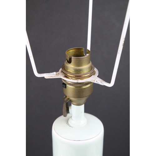 91 - Celadon glazed table lamp decorated with birds and blossoming branched, raised on a hardwood base. (... 