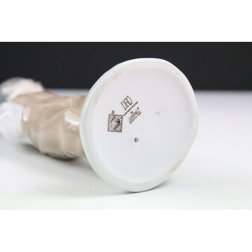 95 - Collection of 11 porcelain figures to include Lladro & Nao, featuring Lladro 4568 Shepherdess with D... 